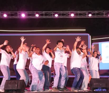 Students celebrating on stage