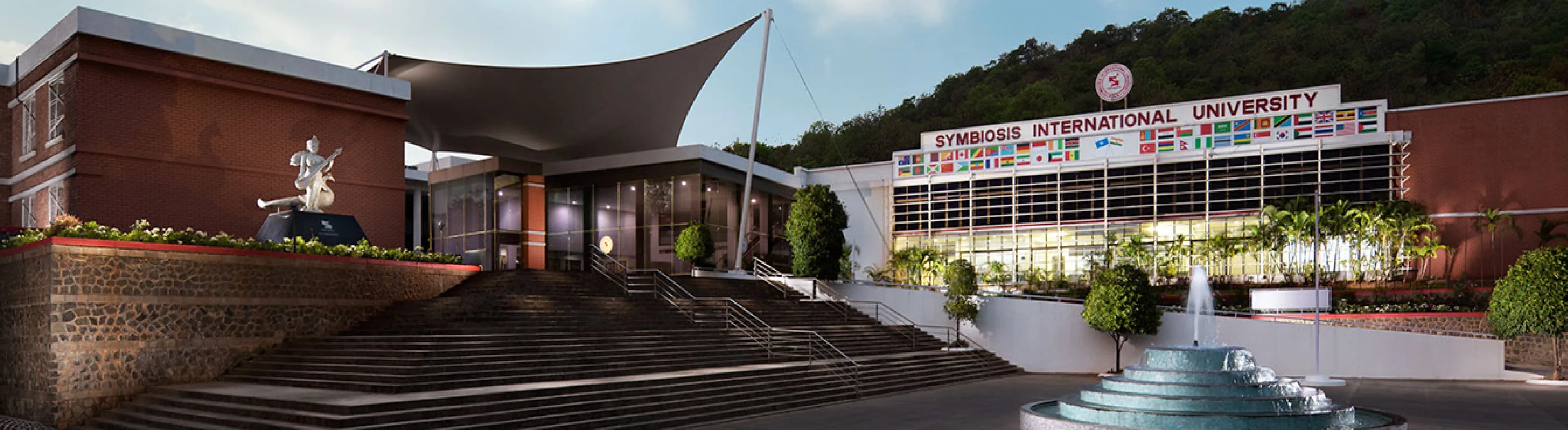 Symbiosis campus building illuminated at night